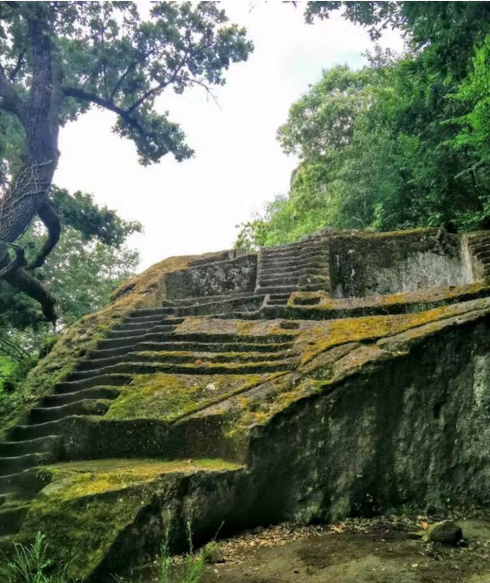 The Etruscan pyramid of Bomarzo, a carved rock with steps
